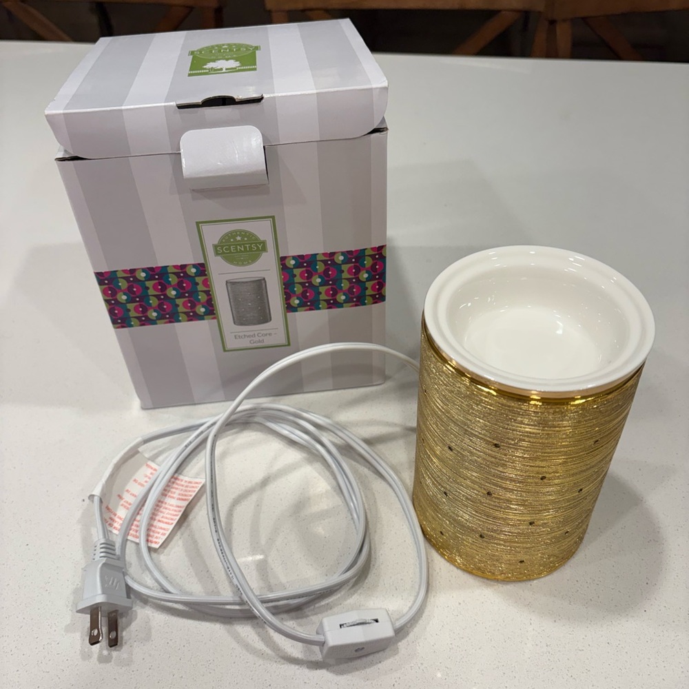 Scentsy gold candle warmer